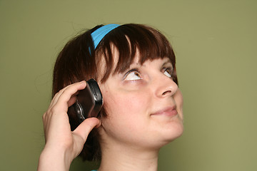 Image showing young woman calling by cellular phone