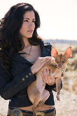 Image showing Hispanic woman and dog