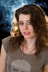 Image showing Pretty young womanl. Isolated on black background