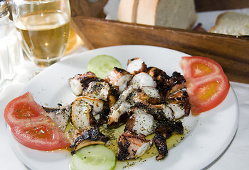 Image showing greek island taverna specialty of marinated grilled octopus