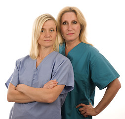 Image showing  team of two nurses in medical scrubs clothes