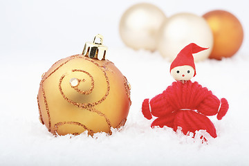 Image showing Christmas elf and baubles.