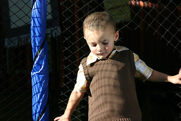 Image showing Little Boy Looking Down