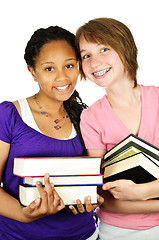 Image showing Girls holding text books