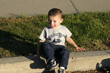 Image showing Little Boy Looking into the Sun