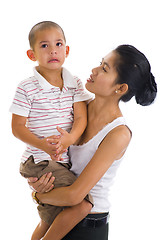 Image showing woman holding a cute crying boy