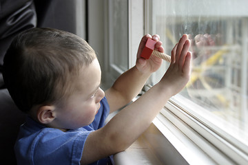 Image showing Child and His Undivided Attention