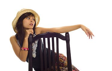 Image showing woman on a wooden chair