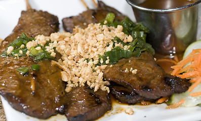 Image showing vietnamese food bo nuong sate grilled beef sate skewers with cru