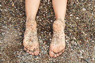 Image showing Feet and rocks