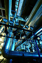 Image showing Pipes, tubes, machinery and steam turbine at a power plant