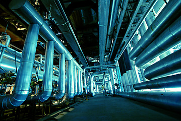 Image showing Pipes, tubes, machinery and steam turbine at a power plant