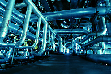 Image showing Pipes, tubes, machinery and steam turbine at a power plant