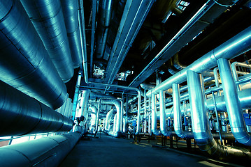 Image showing Pipes, tubes, machinery and steam turbine at a power plant