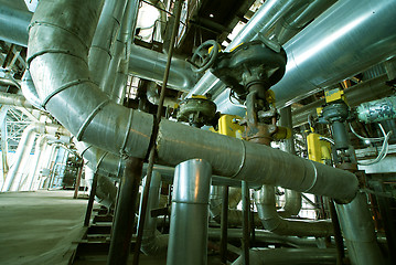 Image showing Pipes, tubes, machinery and steam turbine at a power plant