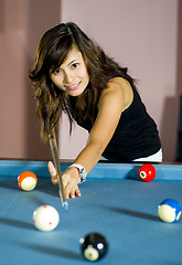 Image showing woman playing pool