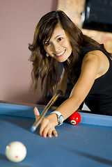 Image showing woman playing pool