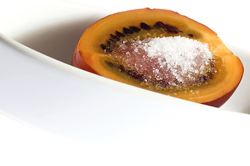 Image showing tropical fruit tamarillo with sugar, isolated on white