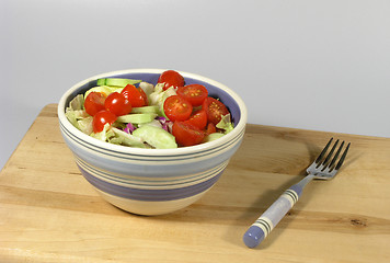 Image showing Salad on Wood