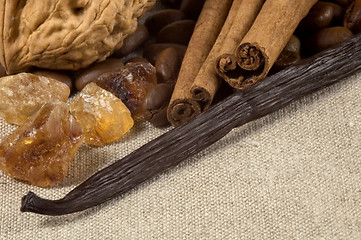 Image showing vanilla, cinnamon sticks and other spices and ingredients. Chris