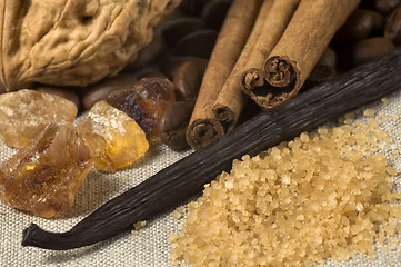 Image showing vanilla, cinnamon sticks and other spices and ingredients. Chris