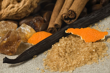 Image showing vanilla, cinnamon sticks and other spices and ingredients. Chris