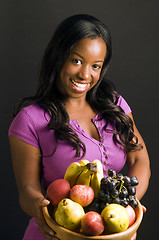 Image showing pretty hispanic african american woman with healthy bowl of fres