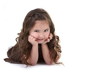 Image showing Child With Mischievious Expression on White Background With Copy