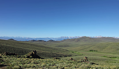 Image showing Sierra Mountains With Green Field