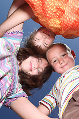 Image showing Three Young Friends Outdoors on a Sunny Day