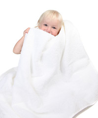Image showing Adorable Baby Boy Holding Towel to His Face Smiling