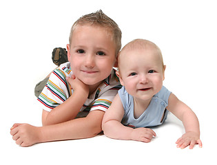 Image showing Young Brothers Lying on Their Stomachs