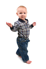 Image showing Adorable Toddler Boy Walking Sideways
