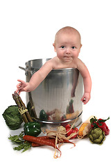 Image showing Baby Boy Hanging Out of a Chef Pot