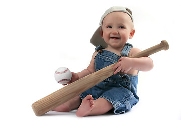 Image showing Baby Boy Holding Baseball Bat and Ball