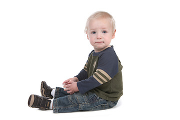 Image showing Serene Baby Boy Sitting Sideways