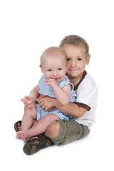 Image showing Two Brothers Sitting Together