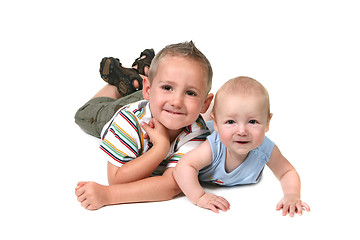 Image showing 2 Brothers Posing for a Portrait Lying Down