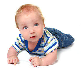 Image showing Big Eyed Baby Boy on His Tummy Looking Up