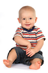 Image showing Cute Baby Boy Toddler Sitting and Holding Hand