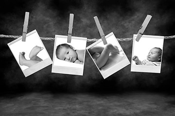 Image showing Black and White Photographs Hanging on a Rope By Clothespins