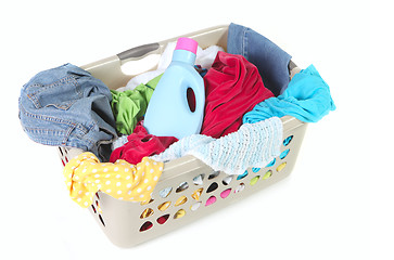 Image showing Laundry Basket Full of Dirty Clothes and Softener