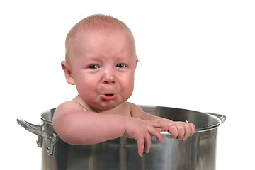 Image showing Pouting Crying Baby Boy in a Chef Pot Prop