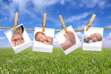 Image showing Sweet Baby Photographs Hanging Outside