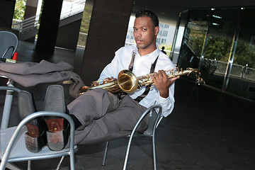 Image showing Jazz Musician Resting Ready to Play Again