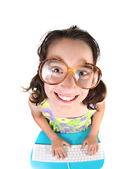 Image showing Nerdy Kid Using Computer Looking Up Smiling