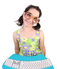 Image showing Girl Wearing Eyeglasses Using a Computer