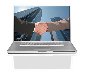 Image showing Business Men Handshake on a Computer Screen