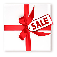 Image showing Pretty Wrapped Holiday Gift With Decorated SALE Tag