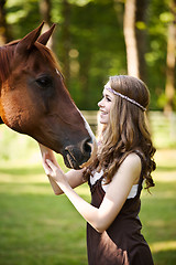 Image showing Girl with horse